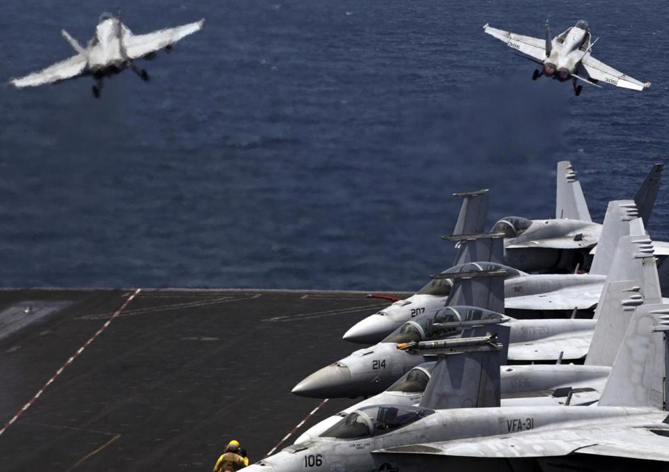 Fighter jets took off for a mission in Iraq from the USS George H.W. Bush in the Persian Gulf. - AP/FILE 2014